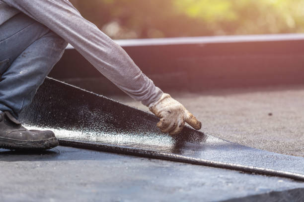 Professional Basement Waterproofing technician working in Robbinsville, NJ